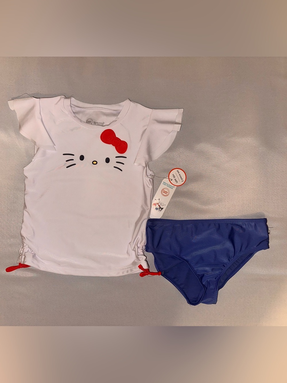 Hello Kitty 2 Piece Swimsuit Set - Girl’s White Rash Guard & Blue Swim Bottoms